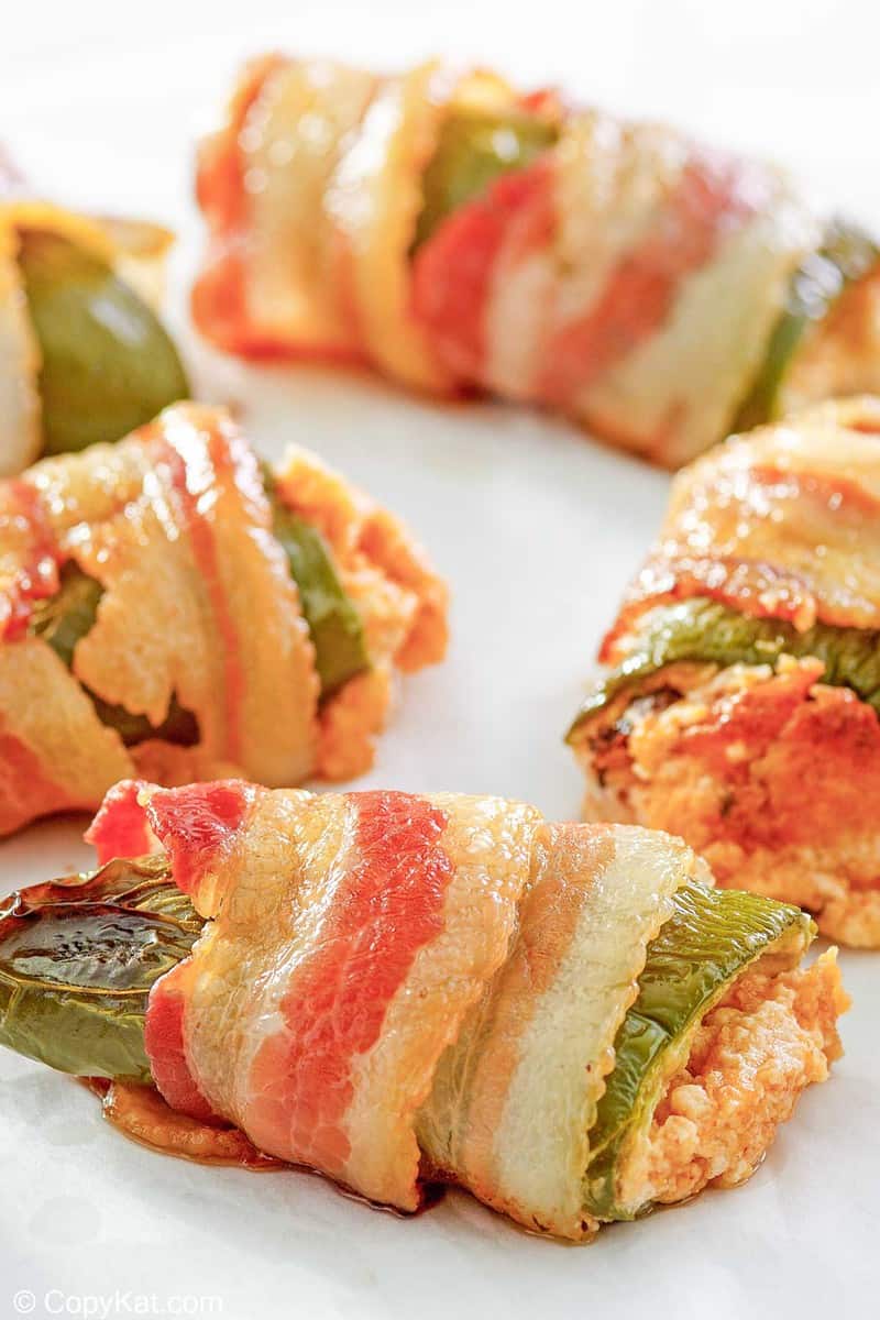 closeup of bacon wrapped jalapeno poppers.