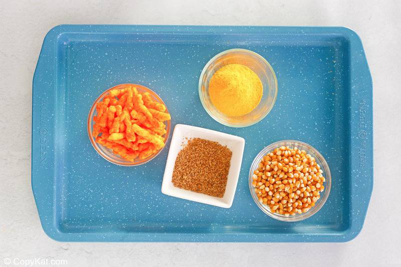 Cheetos popcorn ingredients on a tray.