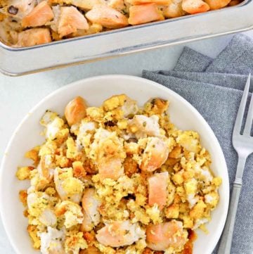 overhead view of chicken and dressing casserole in a baking dish and on a plate.