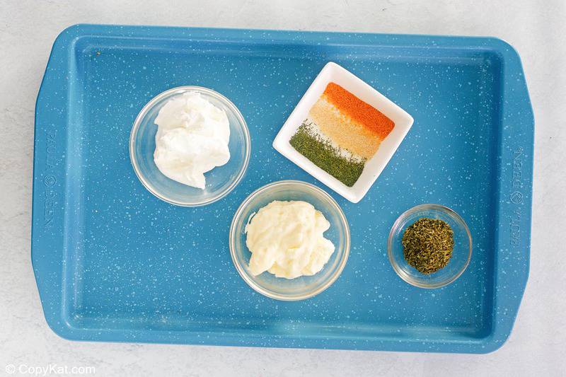 dill dip ingredients on a tray.