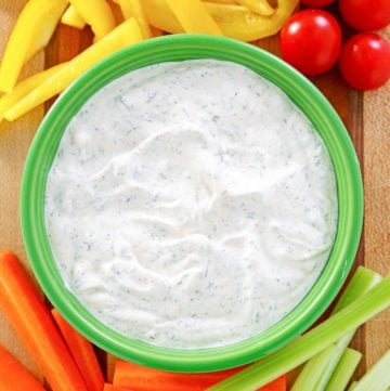 overhead view of dill dip and assorted vegetables.