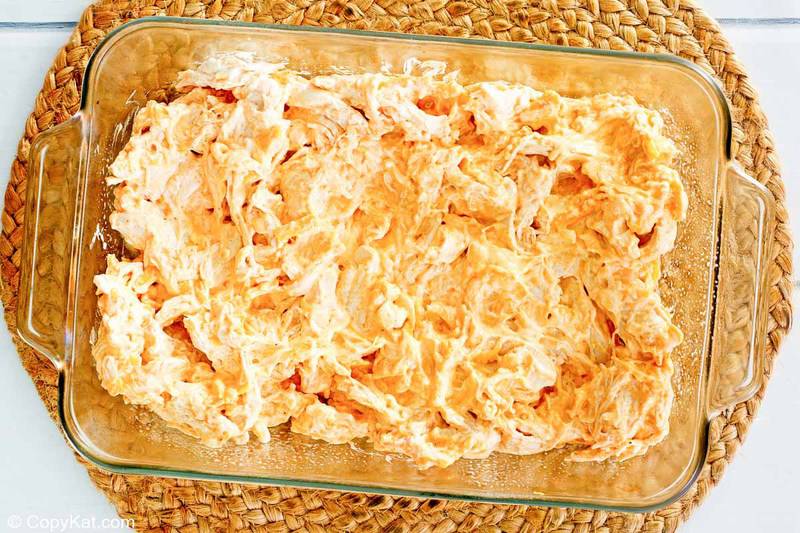 Frank's Buffalo chicken dip in a dish before baking.