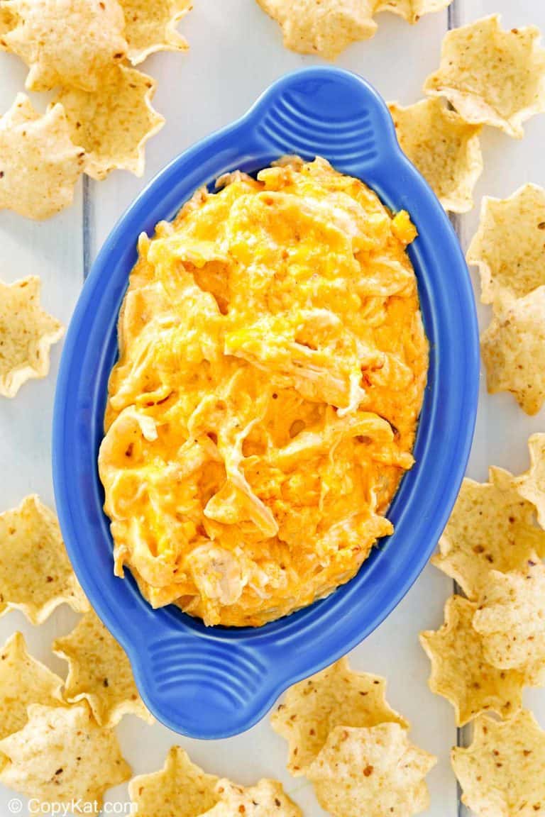 overhead view of Frank's Buffalo chicken dip in a dish and tortilla chips around it.