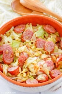 fried cabbage and sausage in a bowl.