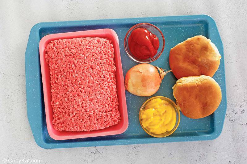 loose meat sandwich ingredients on a tray.