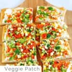 crescent roll veggie patch pizza on a cutting board with text overlay.
