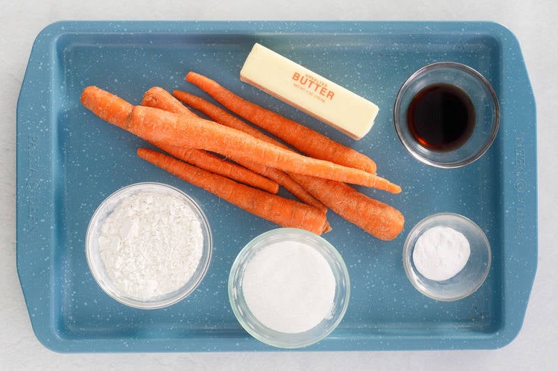 carrot pudding ingredients on a tray.