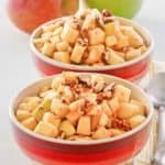 charoset in two bowls and two apples.
