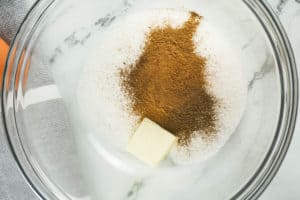 butter, sugar, and spices in a bowl.