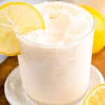 homemade Chick Fil A frosted lemonade garnished with lemon.