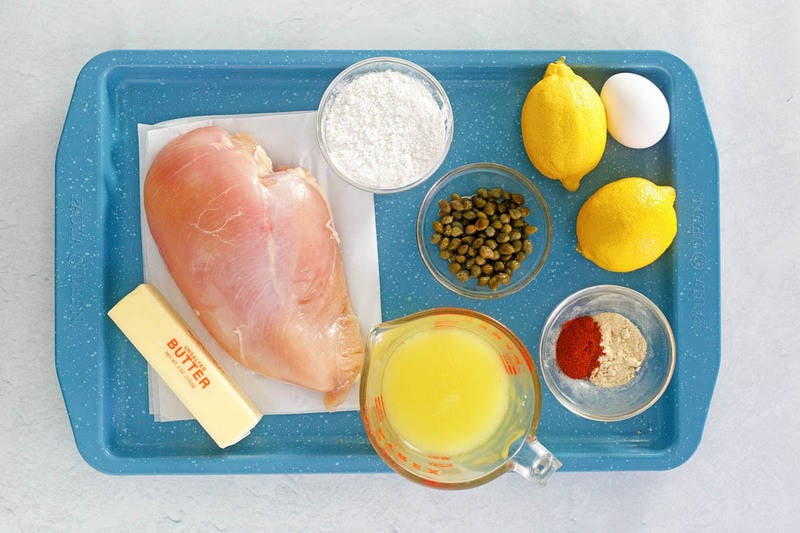 Buca di Beppo chicken limone (lemon chicken) ingredients on a tray.