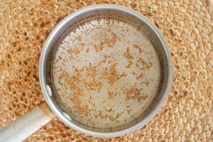 freezer slaw vinegar dressing in a saucepan.