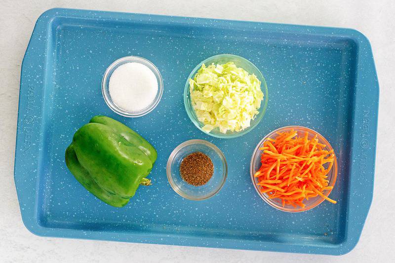 freezer slaw ingredients on a tray.