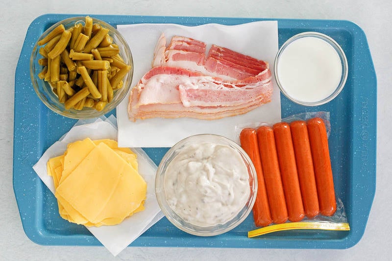 hot dog casserole ingredients on a tray.