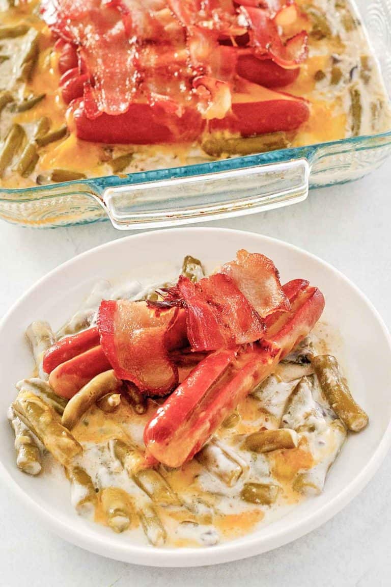 green bean hot dog casserole on a plate and in a baking dish.