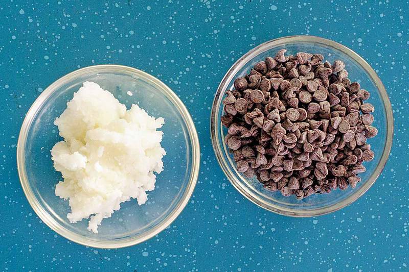 homemade chocolate magic shell ingredients in bowls.