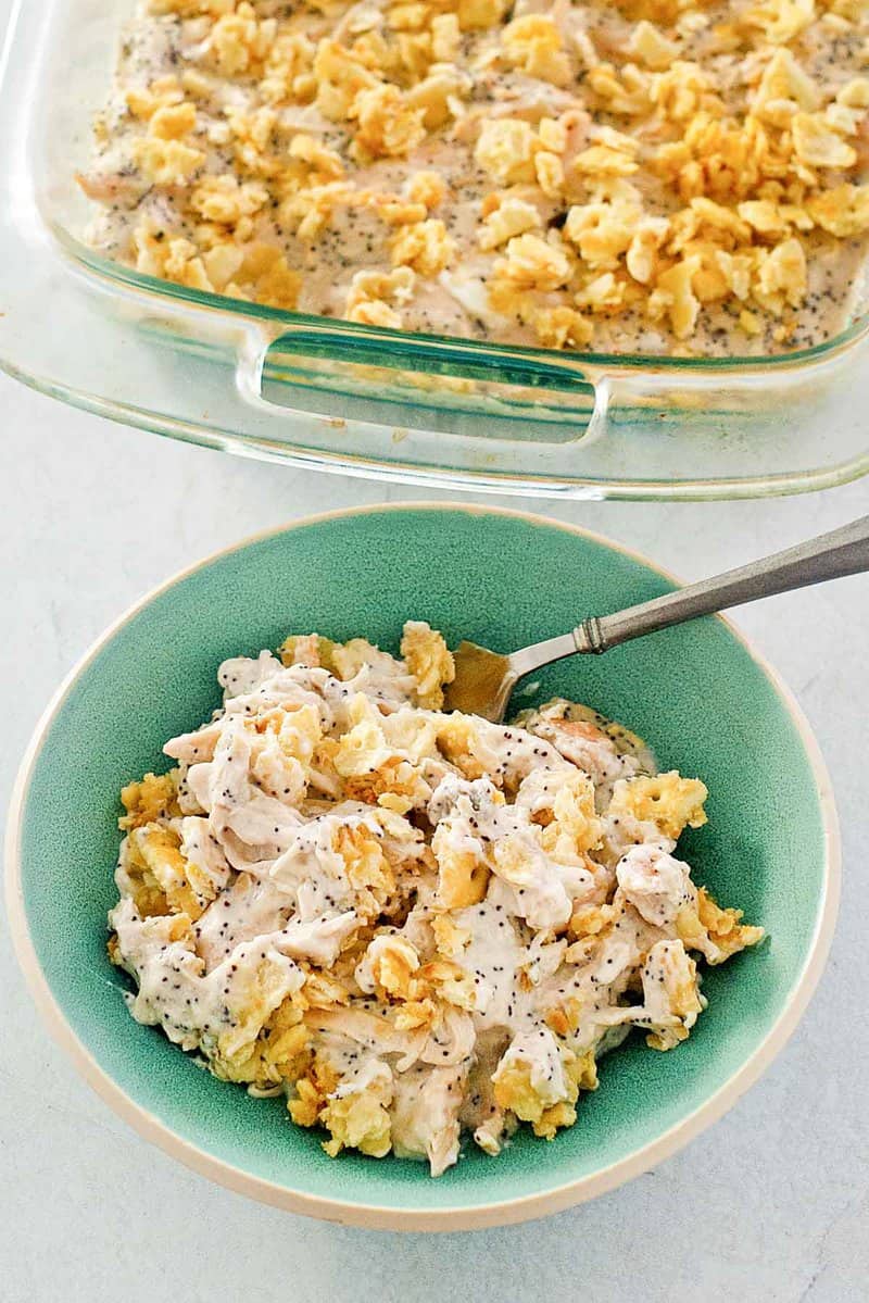 poppy seed chicken casserole in a bowl and baking dish.