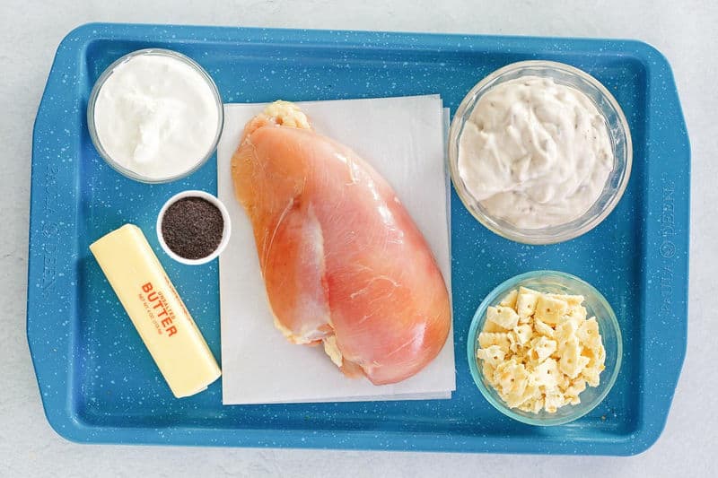 poppy seed chicken casserole ingredients on a tray.