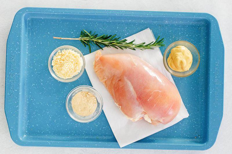 rosemary chicken ingredients on a tray.