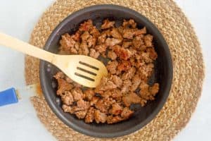 browned ground sausage in a skillet.