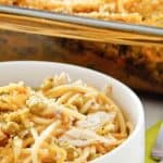 chicken tetrazzini in a white bowl and glass baking dish.