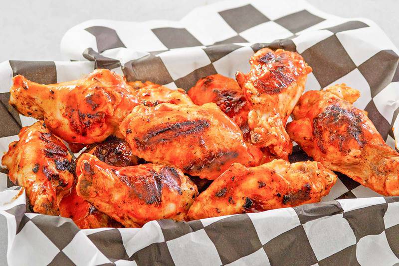 a basket of buffalo chicken wings.