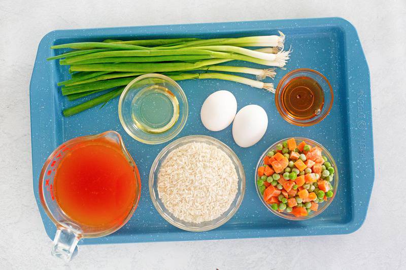 Panda Express fried rice ingredients on a tray.