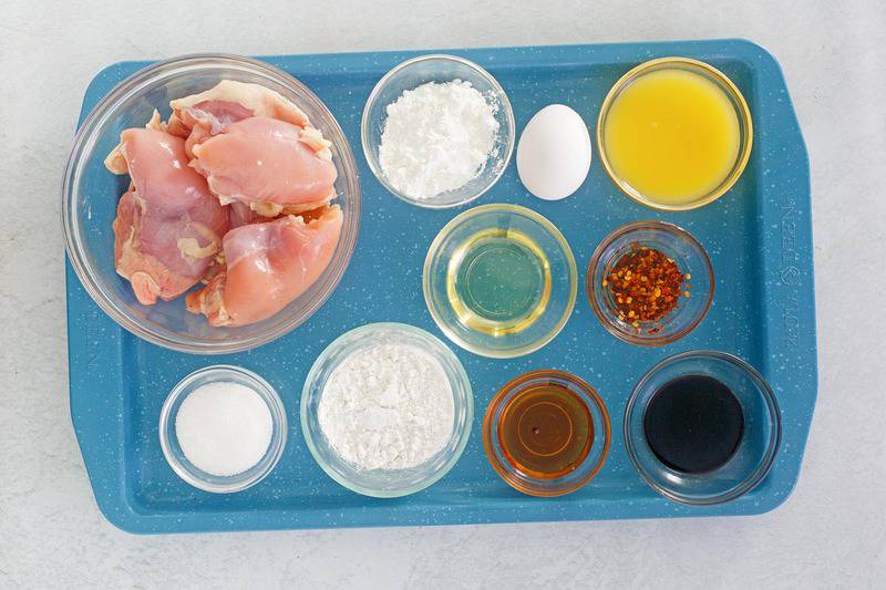 Panda Express orange yellow ingredients on a tray.