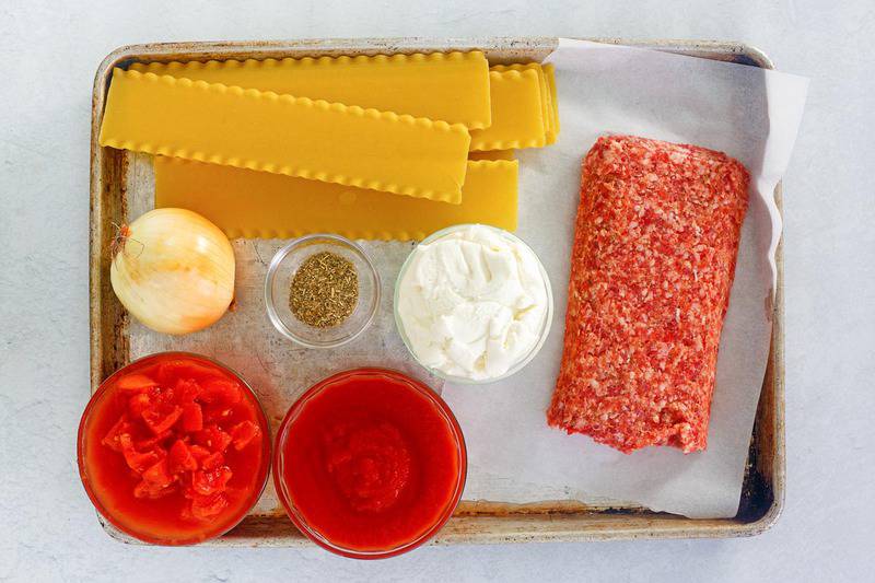 skillet lasagna ingredients on a baking sheet.