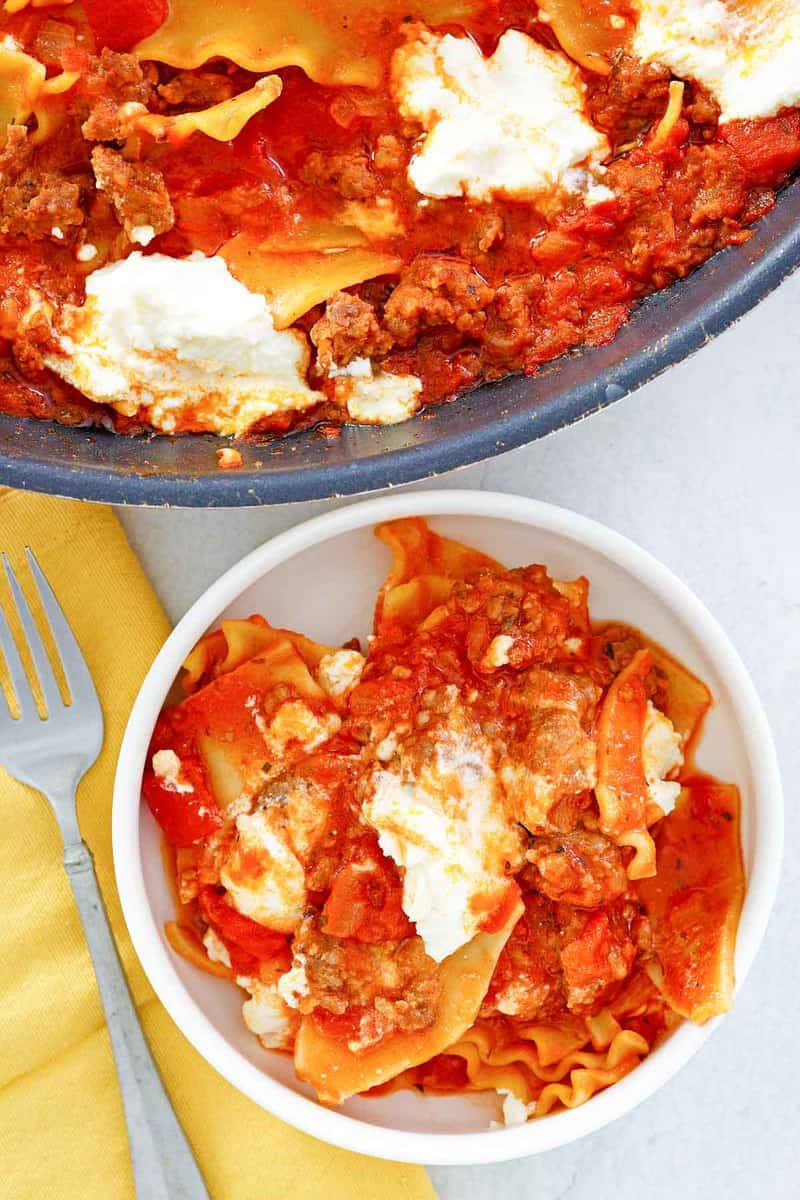 overhead view of lasagna in a trencher and a skillet.