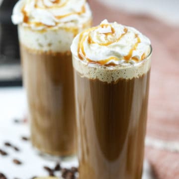 two homemade Starbucks salted caramel latte drinks.