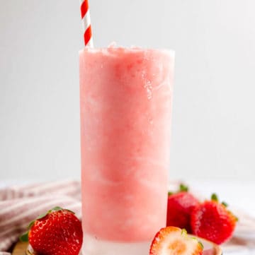 homemade Wendy's Strawberry Frosty and fresh strawberries.