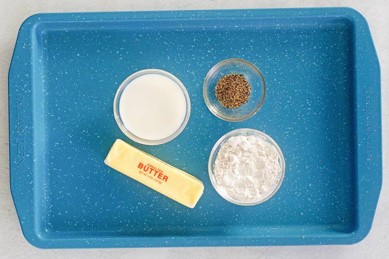 white gravy ingredients on a tray.