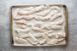 beer battered chicken tenders before frying.