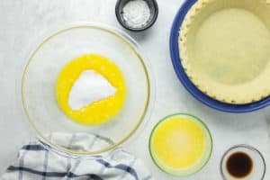 eggs and sugar in a mixing bowl.