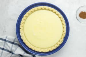 buttermilk pie filling in a pie crust.