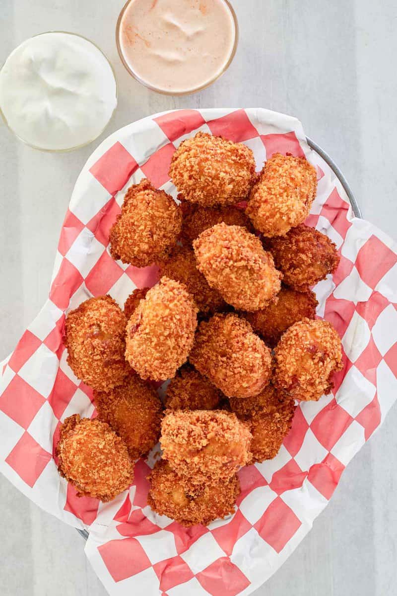 copycat Cheesecake Factory loaded baked potato tots and dipping sauces.