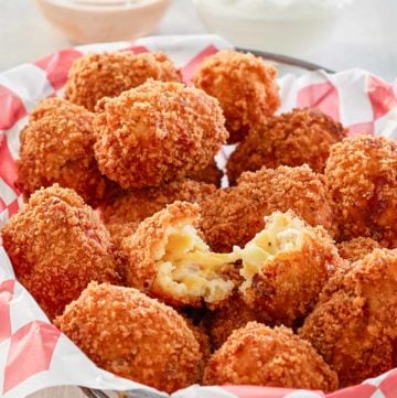 copycat Cheesecake Factory loaded baked potato tots in a basket.