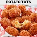 copycat Cheesecake Factory loaded potato tots in a parchment paper lined basket.