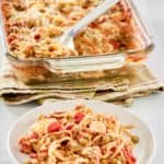 chicken spaghetti casserole on a plate and in a baking dish.