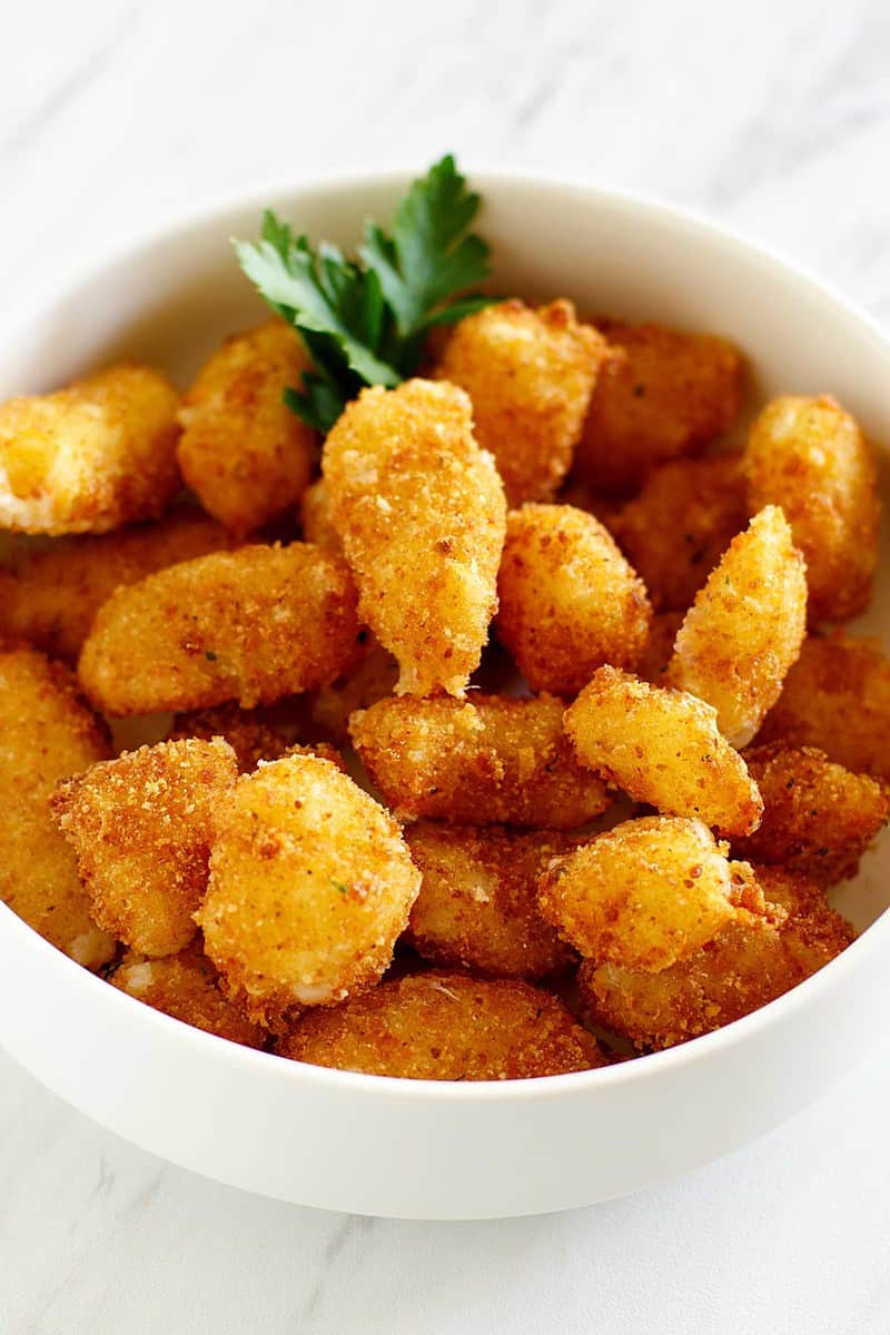 a bowl of fried cheese curds.