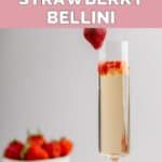 copycat Grand Lux Cafe Strawberry Bellini and fresh strawberries.