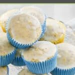 lemon poppy seed muffins with lemon glaze on a platter.