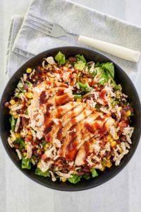 overhead view of copycat Panera BBQ chicken salad and a fork on a napkin.