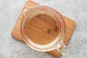 copycat Starbucks classic syrup cooling in a measuring cup.