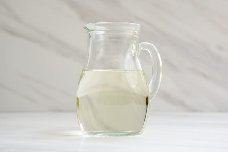 a small pitcher with homemade Starbucks classic syrup.