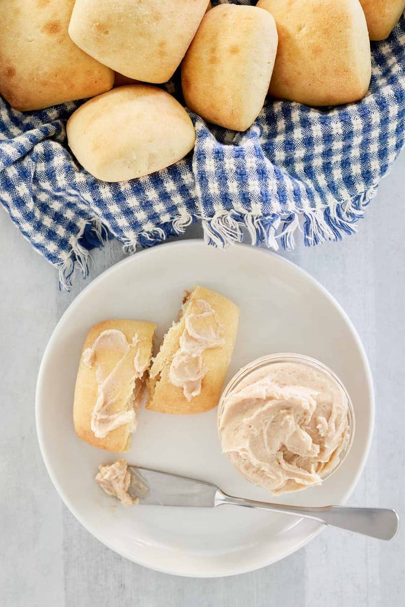 overhead view of copycat Texas roadhouse butter and rolls.