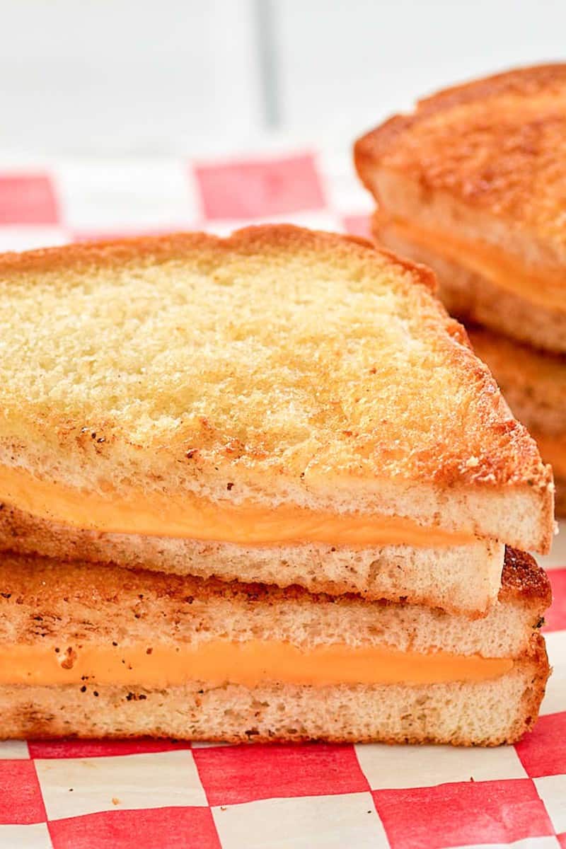 closeup of an air fryer grilled cheese sandwich.