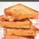 air fryer grilled cheese sandwiches cut in half.