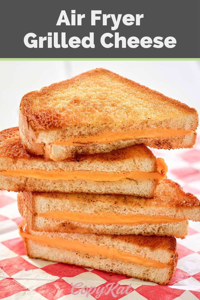 air fryer grilled cheese sandwiches cut in half.
